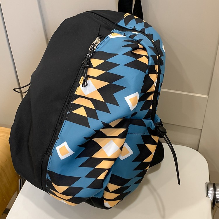 Graffiti comic fashion schoolbags for both boys and girls, backpacks for junior high school and college students, and men's and women's same style backpacks for leisure travel details Picture