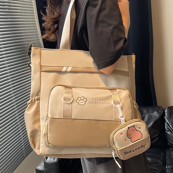 2025 New Korean version large-capacity junior high school girl heart student schoolbag, casual and simple travel tutorial bag for girls, crossbody bag Application Scenario