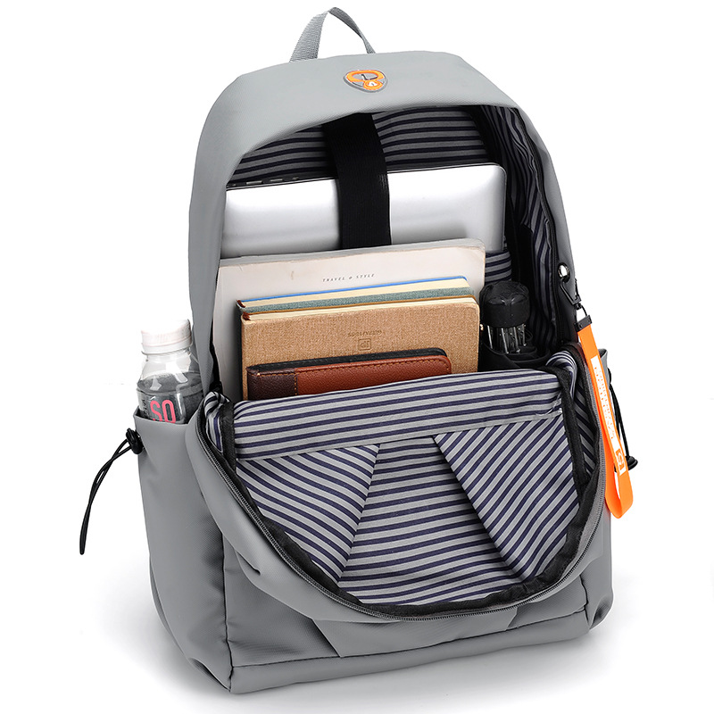 Wholesale of men's casual and trendy backpacks, computer bags, travel large-capacity backpacks, and school bags for junior high school, senior high school and college students Application Scenario