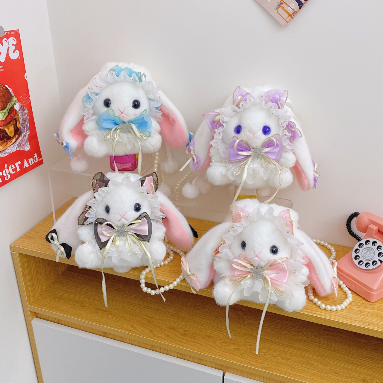 The new Carton Japanese Lolita Rabbit pearl hand-held crossbody bag is a sweet and cute Korean version of a crossbody single-shoulder small bag full figure