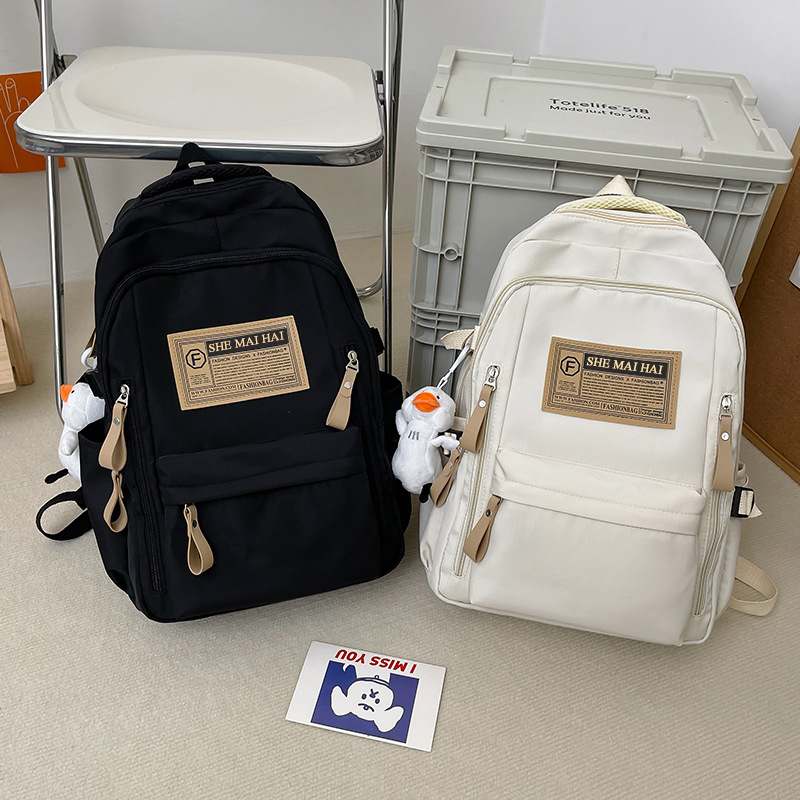Spring outing backpack with high appearance level, new schoolbag, lightweight for high school and junior high school students, large-capacity travel and study bag for girls full figure
