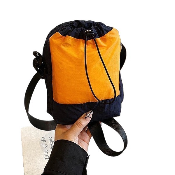 Lightweight outdoor single-shoulder small bag, travel crossbody bag, multi-functional mobile phone bag for men and women, cycling travel water bottle and cup bag Item Picture