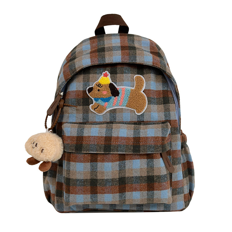 This Korean version of a large-capacity checkered backpack is a simple, cute and cartoonish lightweight backpack for middle and high school students on campus Item Picture