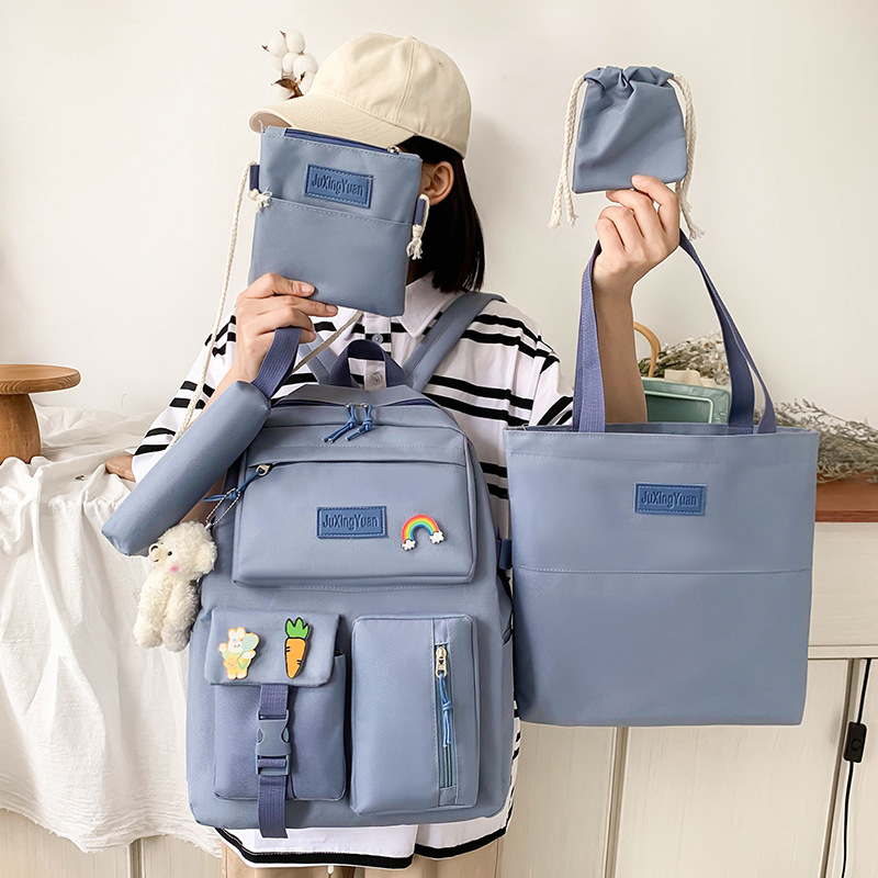 New type of schoolbag for girls, Korean version, Harajuku style, large-capacity campus five-piece set, girls' backpack, student backpack full figure