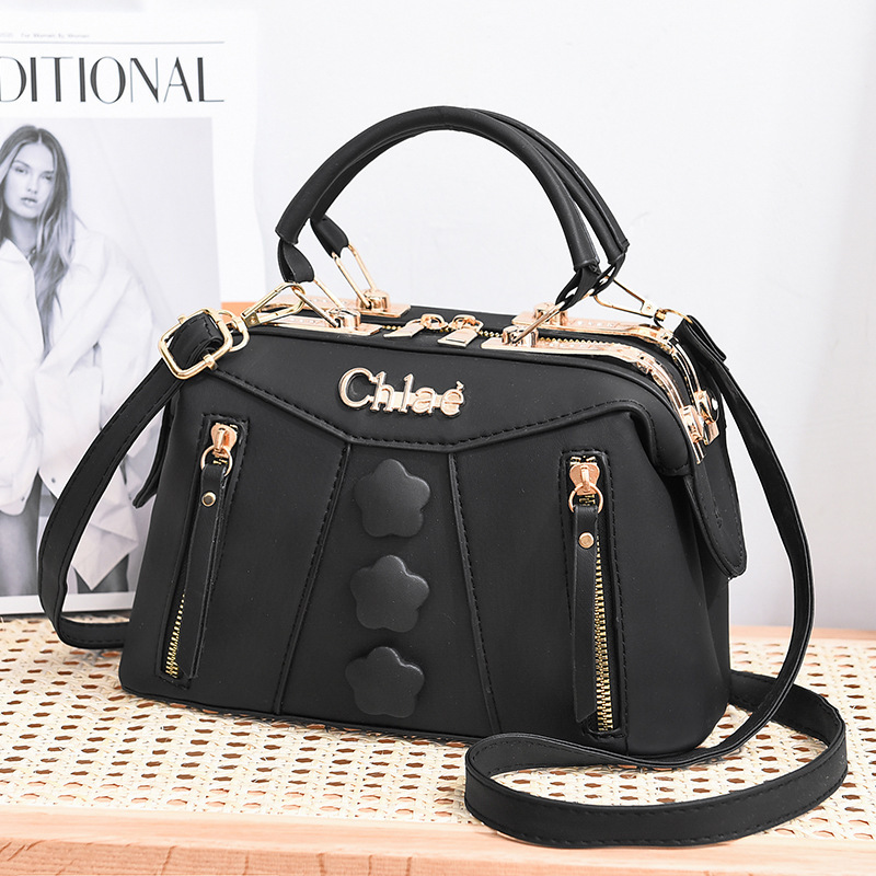 The 2022 new women's handbag is a trendy and fashionable large-capacity women's bag, a cross-border single-shoulder crossbody solid color button bag full figure