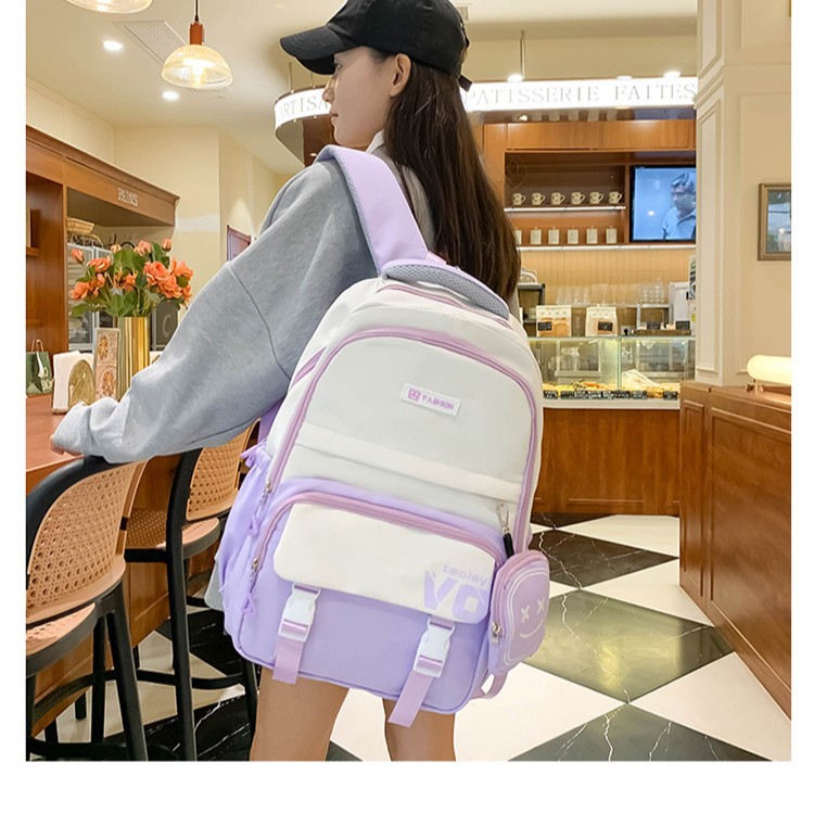 The new large-capacity, wear-resistant and stylish backpack for junior and senior high school students can be carried on their shoulders during class full figure