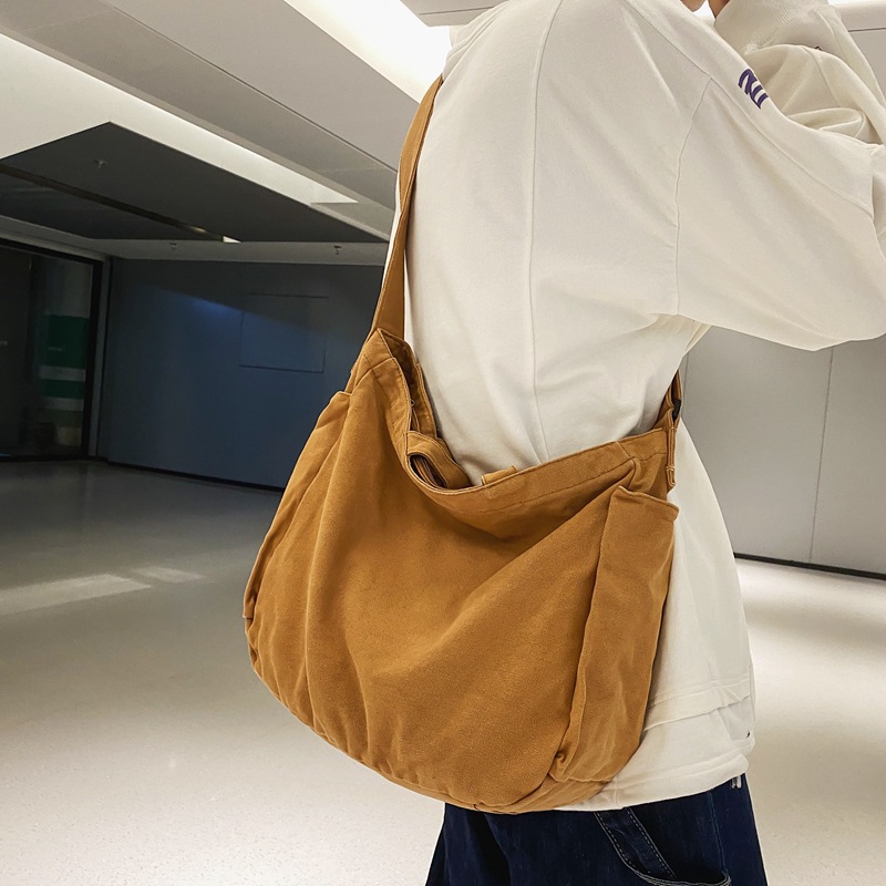 Japanese crossbody bag with artistic style, canvas bag for women 2024 new model, large capacity, solid color, simple hand-held shoulder bag for women details Picture