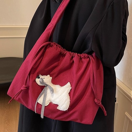 A new large-capacity casual commuting bag for women, a lightweight and versatile single-shoulder bag, and a plush puppy casual commuting tote bag full figure