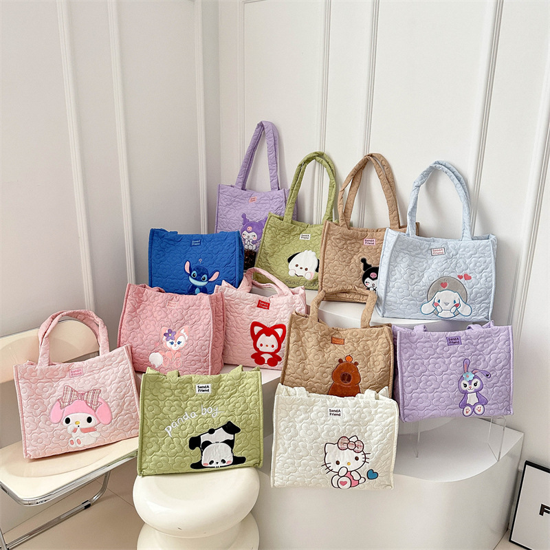 Wholesale of Katong's new panda Strawberry Bear handbag with large capacity magnetic clasp and cute single-shoulder tote bag storage bag full figure