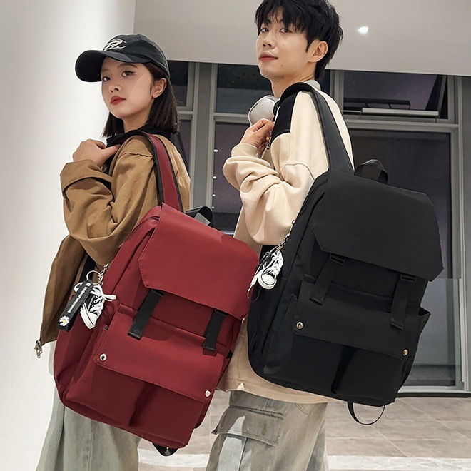 A simple solid-color backpack for high school students, a large-capacity, lightweight and lighter-load student backpack full figure
