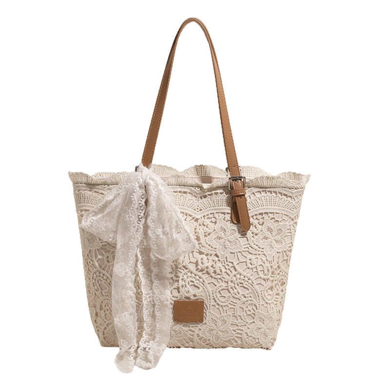 Korean lace bow large-capacity tote bag for women 2025 new style, hollowed-out, versatile and simple single-shoulder armpit bag Item Picture