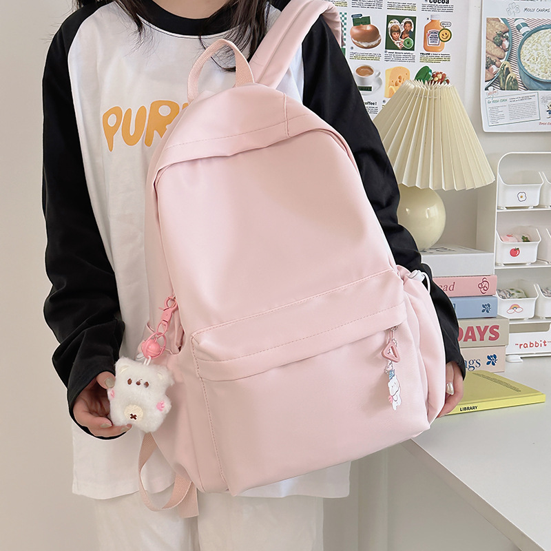 Simple foresty-style backpack with lettered schoolbag, new model for campus 2025, versatile for commuting, large capacity, solid color for going out details Picture
