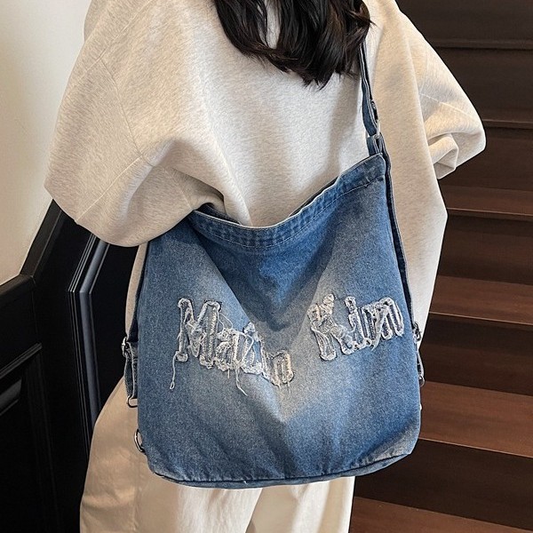2025 New style pure beige retro fringed washed embroidered letter denim backpack, large capacity ins single-shoulder bag for women full figure