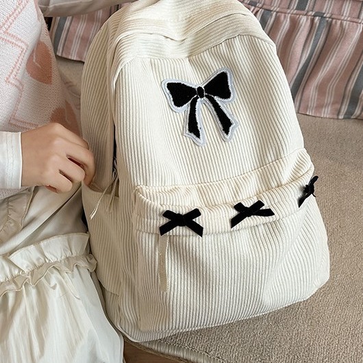 Cute, fresh and sweet bow schoolbag, large-capacity backpack for girls, corduroy backpack for middle and high school students Application Scenario