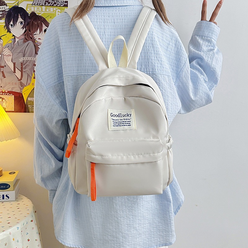 Simple small schoolbag, pure color Korean version, high school and college students' travel versatile backpack, casual large-capacity backpack Specification drawing