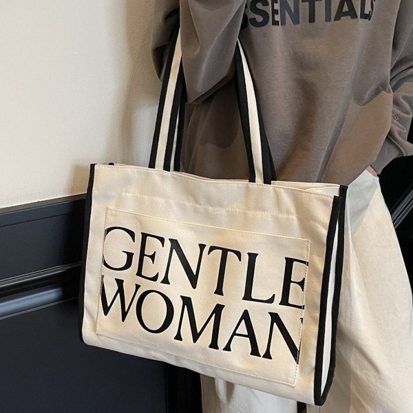 Casual and versatile hand-held large bag for women 2025 new Spring/Summer fashionable and simple tote bag, artistic letter single-shoulder bag full figure