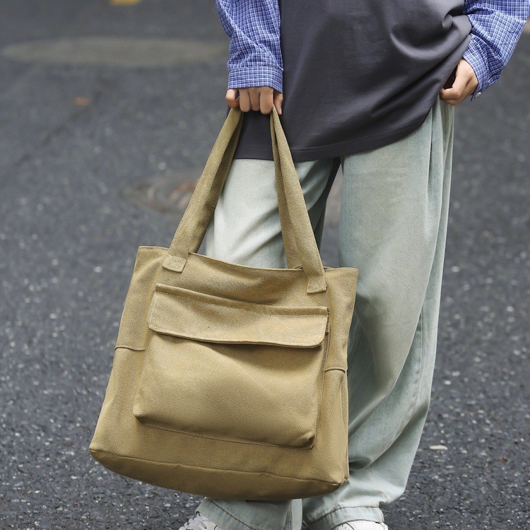 Autumn and winter large-capacity sail handbag, Japanese-style casual and simple commuting bag, suitable for both men and women, versatile and lightweight tote bag Application Scenario