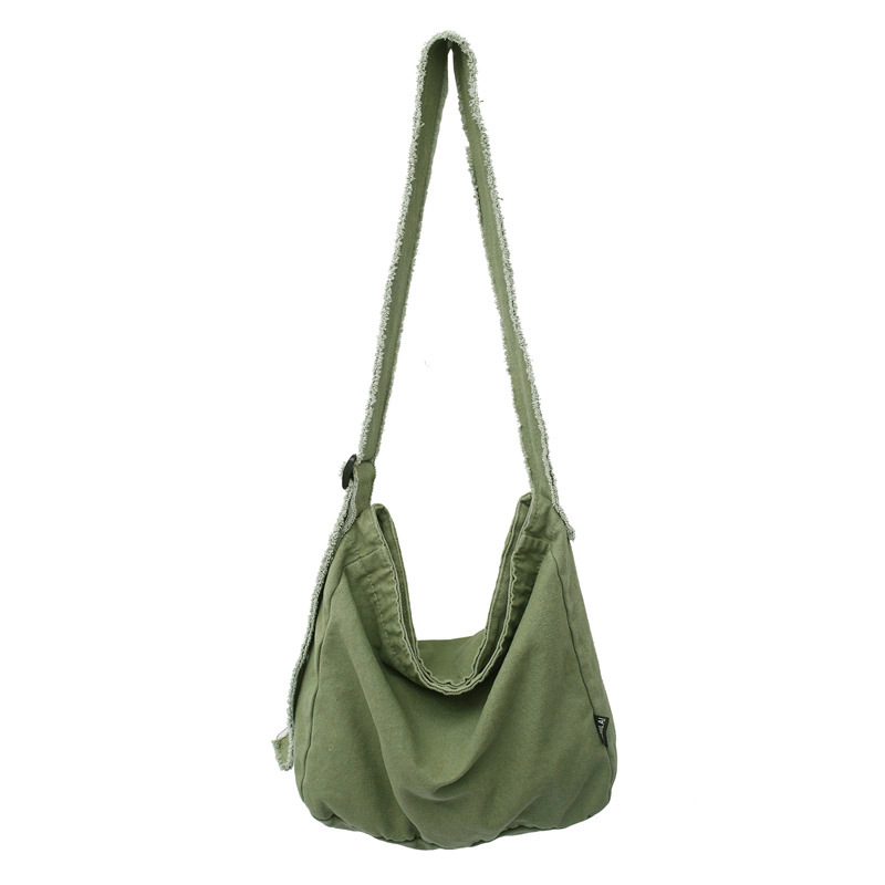 Washed canvas bag with fringed and aged edges, artistic single-shoulder bag, student class backpack, laid-back and simple cloth bag, crossbody bag Item Picture