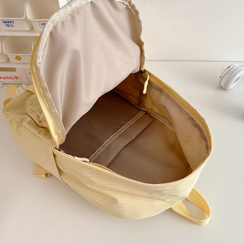Soft and cute cream-yellow kindergarten children's travel backpack, high appearance level, ins sweet and girlish mini backpack Application Scenario