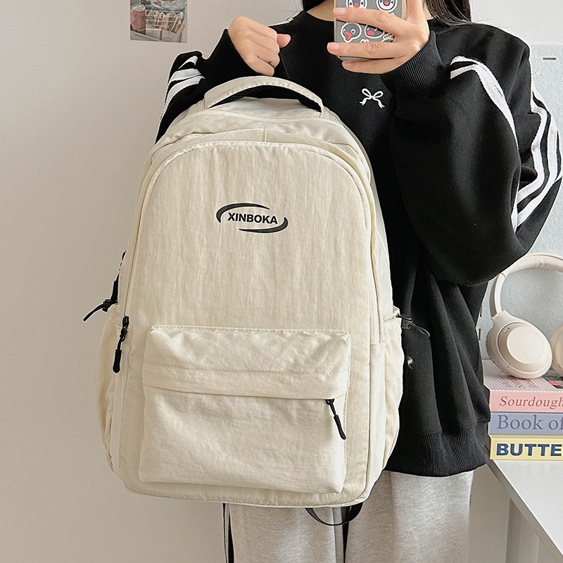 2024 New style college student backpack for girls, high school and junior high school students, casual large-capacity short-distance travel backpack full figure
