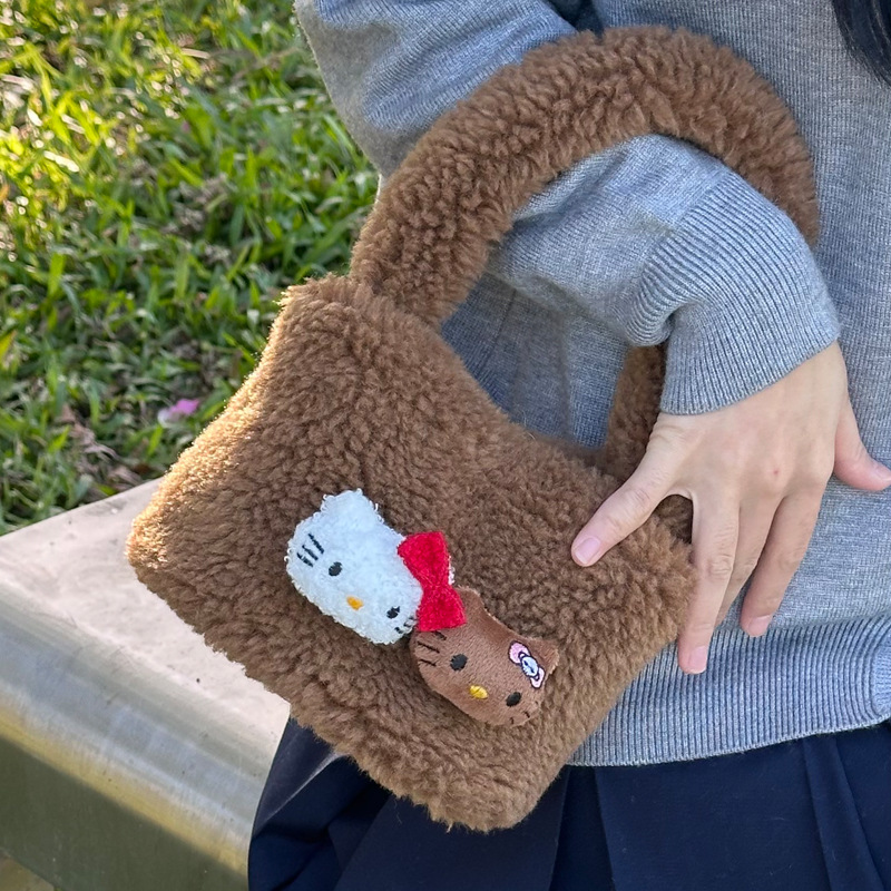 New autumn and winter style lamb cute kt plush bucket bag, three-dimensional hand-held bag, vegetable basket, magnetic buckle handbag, casual bag full figure