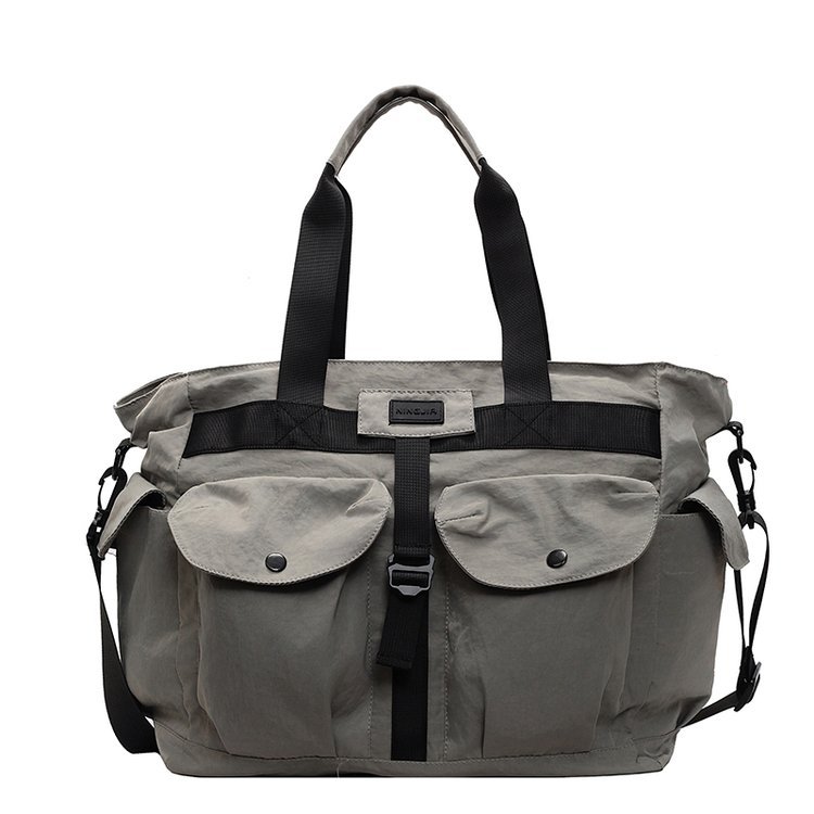 A new Korean version large-capacity travel bag, a simple fitness yoga bag for women, a multi-pocket casual and lightweight boarding crossbody bag Item Picture
