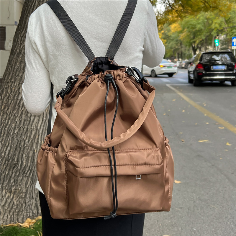 Single-shoulder crossbody bag 2025, fashionable and casual bucket bag, new Korean version, double-shoulder women's bag, large capacity hand-held drawstring bag Specification drawing