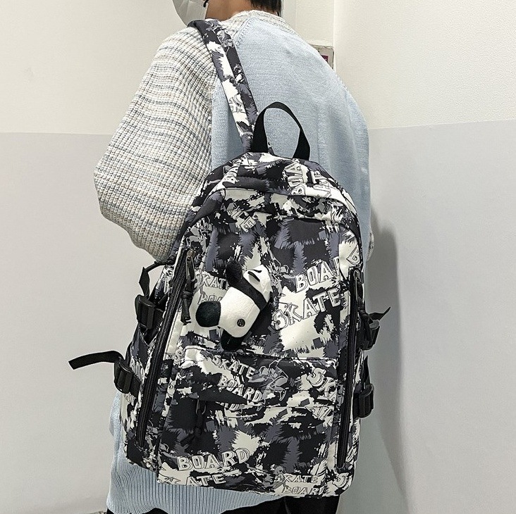 Men's Japanese-style versatile large-capacity casual travel bag, women's fashionable and cool schoolbag, college student couple backpack full figure