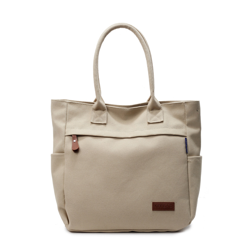 Spring and summer women's versatile tote bags, large-capacity canvas bags, solid-color design hand-held shoulder bags, trendy Item Picture