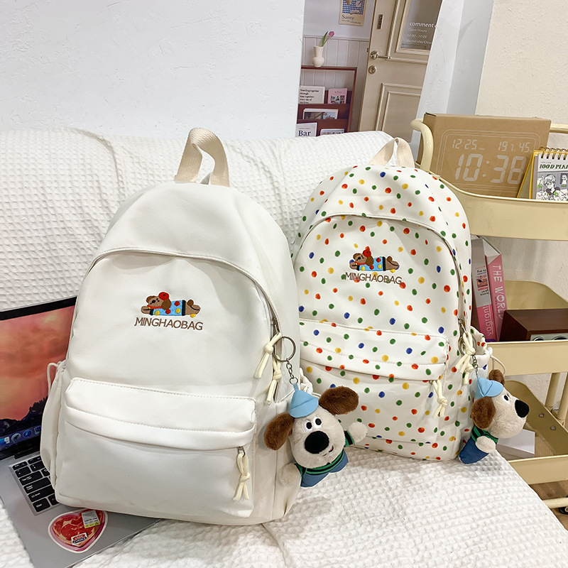 Cute and soft girl polka dot dog backpack, new high school, junior high school and college students' backpacks, travel backpacks full figure