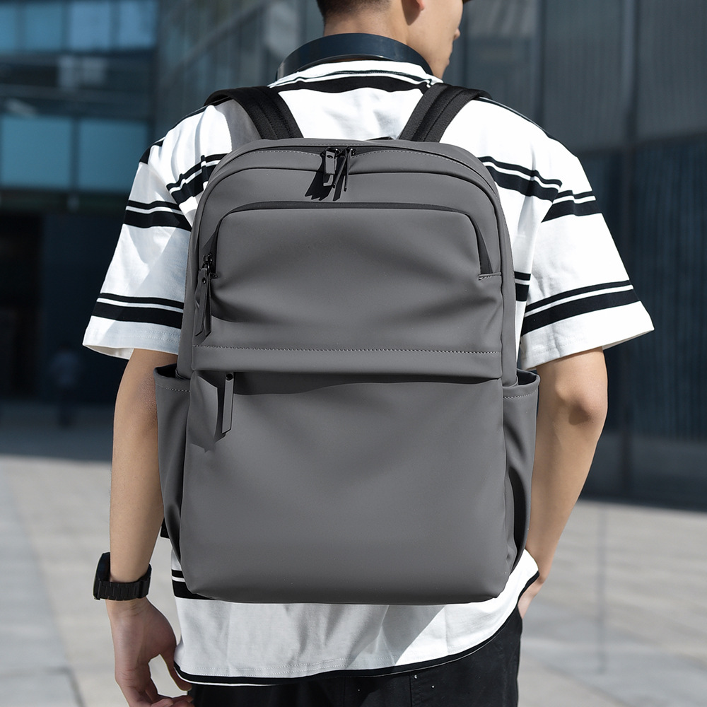Wholesale of new fashionable and simple casual backpacks, men's backpacks, large-capacity multi-functional computer bags and lightweight travel bags full figure