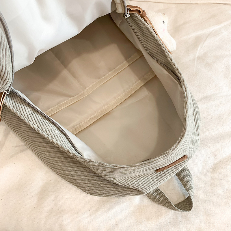 Japanese-style schoolbag for girls on Instagram, forest-themed casual middle school backpack, artistic corduroy girl's shopping backpack Application Scenario