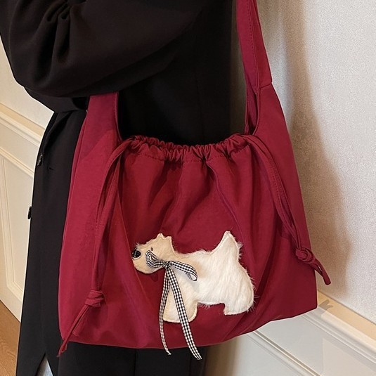 A new large-capacity casual commuting bag for women, a lightweight and versatile single-shoulder bag, and a plush puppy casual commuting tote bag details Picture