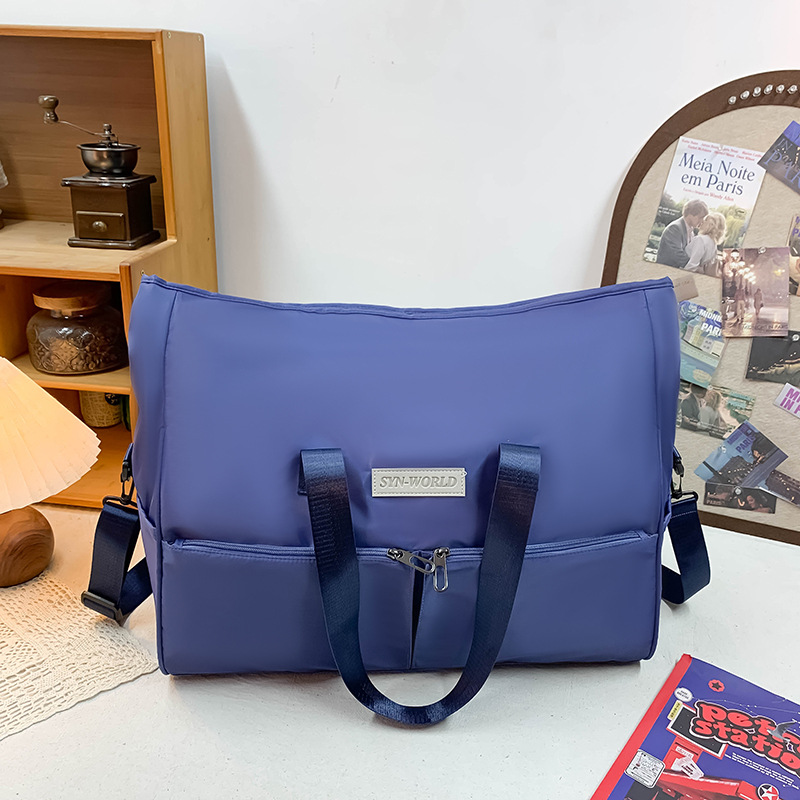 Travel bags for both men and women, hand-held sports and fitness bags, dry and wet separation luggage bags for short business trips, and bags for pregnant women waiting to give birth full figure