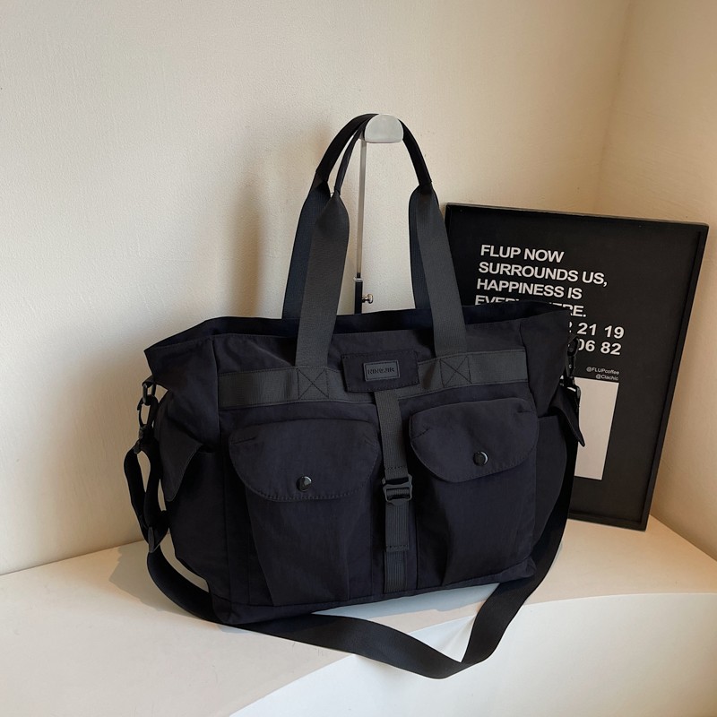 A new Korean version large-capacity travel bag, a simple fitness yoga bag for women, a multi-pocket casual and lightweight boarding crossbody bag details Picture