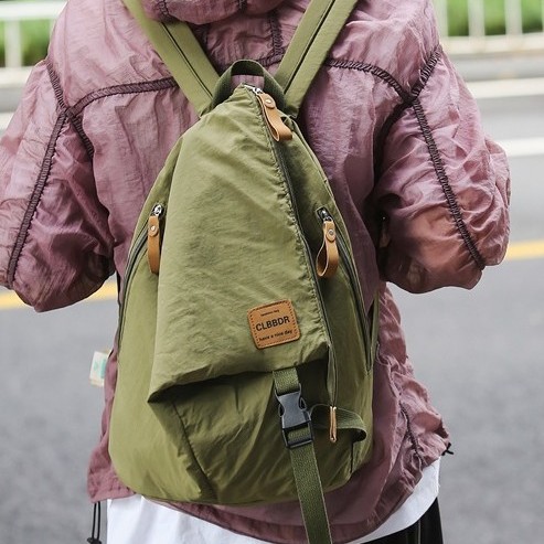 A new Japanese backpack for both men and women, a couple's style, a versatile student schoolbag, a large-capacity backpack, and a folding backpack Application Scenario