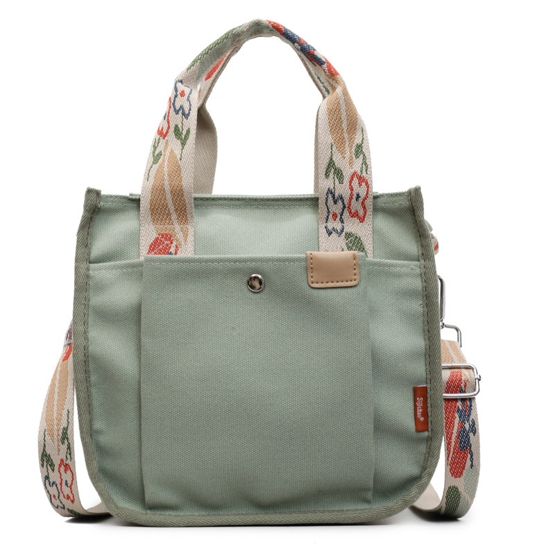 Large-capacity cross-border canvas letter handbag for women, 2025 new style, trendy, lightweight, simple and versatile crossbody bag for commuting Item Picture
