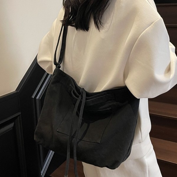 Solid-color canvas crossbody bag for women, bow-designed postman bag, large-capacity single-shoulder bag for women, and schoolbag for students Specification drawing