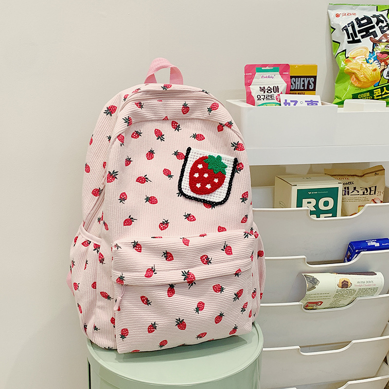 A fresh, artistic, retro strawberry, versatile, ins Japanese style, simple and casual, cute student backpack for young girls Application Scenario