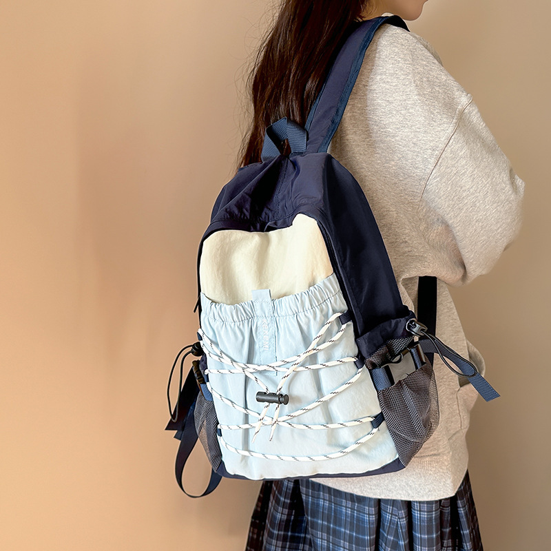 Color-blocking lightweight backpack for girls, large-capacity sports and outdoor hiking backpack, and trendy rope-wearing schoolbag for male college students details Picture