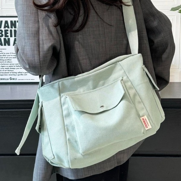 Single-shoulder bag for men, simple Japanese canvas bag, 2025 new style Korean crossbody bag, student backpack, casual messenger bag for women Application Scenario