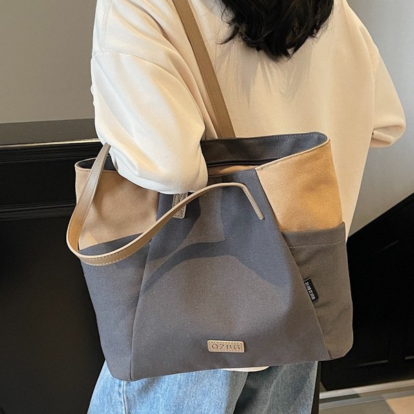 Color-blocking single-shoulder bag for women, large-capacity school commuting tote bag, lightweight and high-end bag, travel and business trip casual handbag Application Scenario