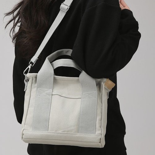 Solid-color canvas trendy and individualistic daily commuting small bag, eye-catching simple women's bag, single-shoulder bag, crossbody handbag details Picture