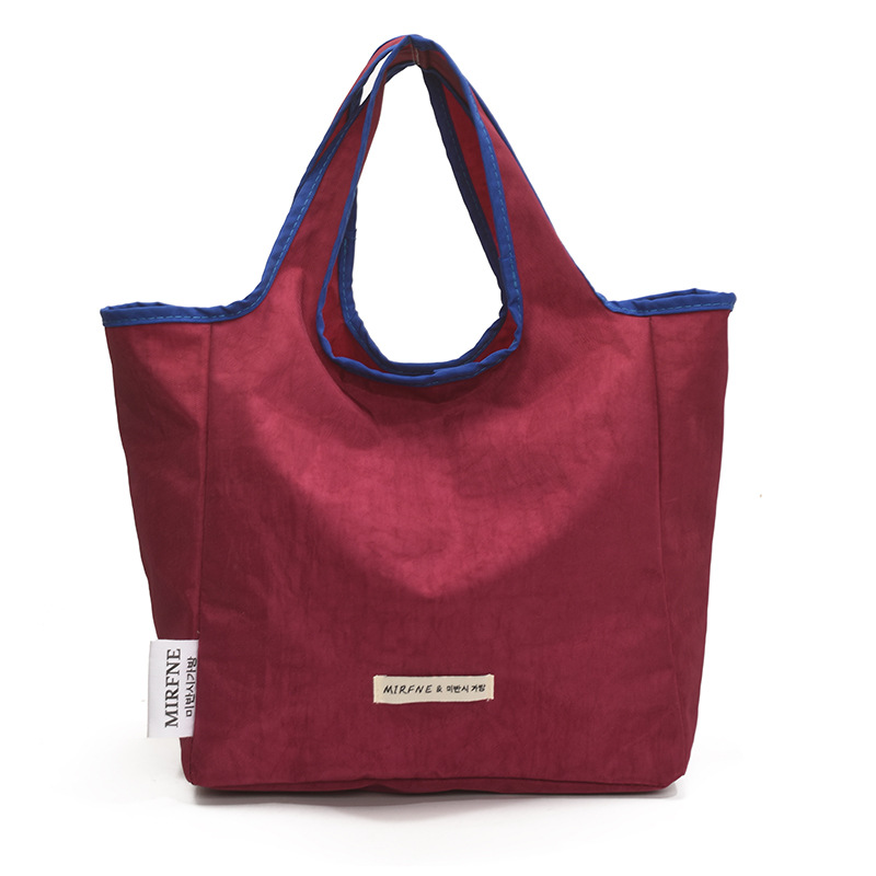 Korean casual large-capacity bucket bag for women 2025 summer, simple nylon fabric single-shoulder bag, shopping bag, handbag Item Picture