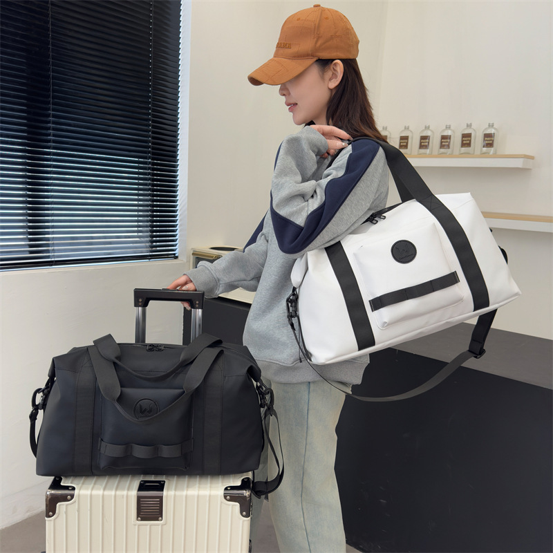 Simple and casual training and fitness bag, short business trip and travel luggage storage bag, large-capacity casual outdoor sports bag details Picture