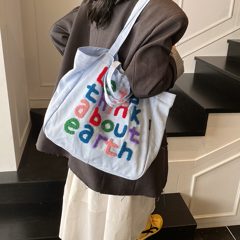 The 2025 new high-appearance, large-capacity commuter tote bag for women, a trendy single-shoulder bag with colorful letters, and a versatile underarm bag Specification drawing