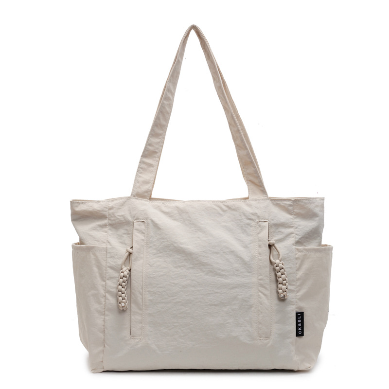New cross-border solid-color canvas bag, women's large-capacity single-shoulder bag, 2025 new student versatile tote bag, handbag Item Picture