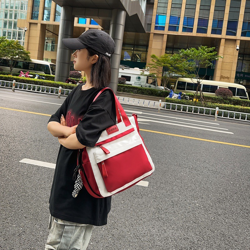 Japanese-style trendy and versatile single-shoulder bag, female college student commuting backpack for classes, large-capacity hand-held tutorial bag, crossbody bag details Picture
