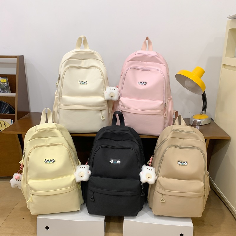 Cute schoolbag for girls, large-capacity backpack for junior and senior high school campuses, simple solid-color backpack for girls, high appearance level casual bag Application Scenario