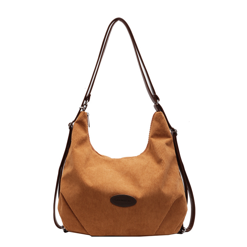 A large-capacity corduroy bag for women, a new 2024 trendy and versatile crossbody bag, a tote bag that students often use for commuting to school Item Picture
